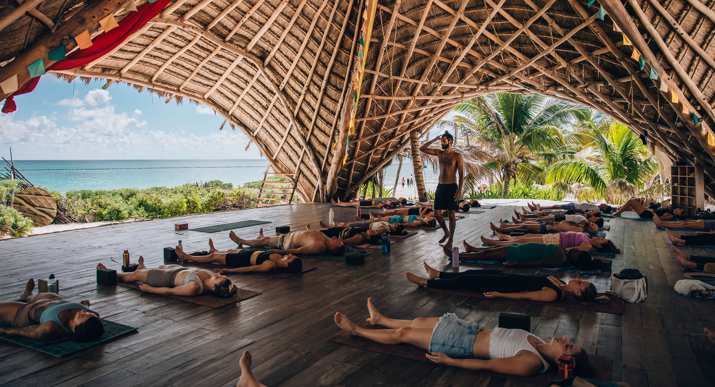 Beachfront yoga at sunrise